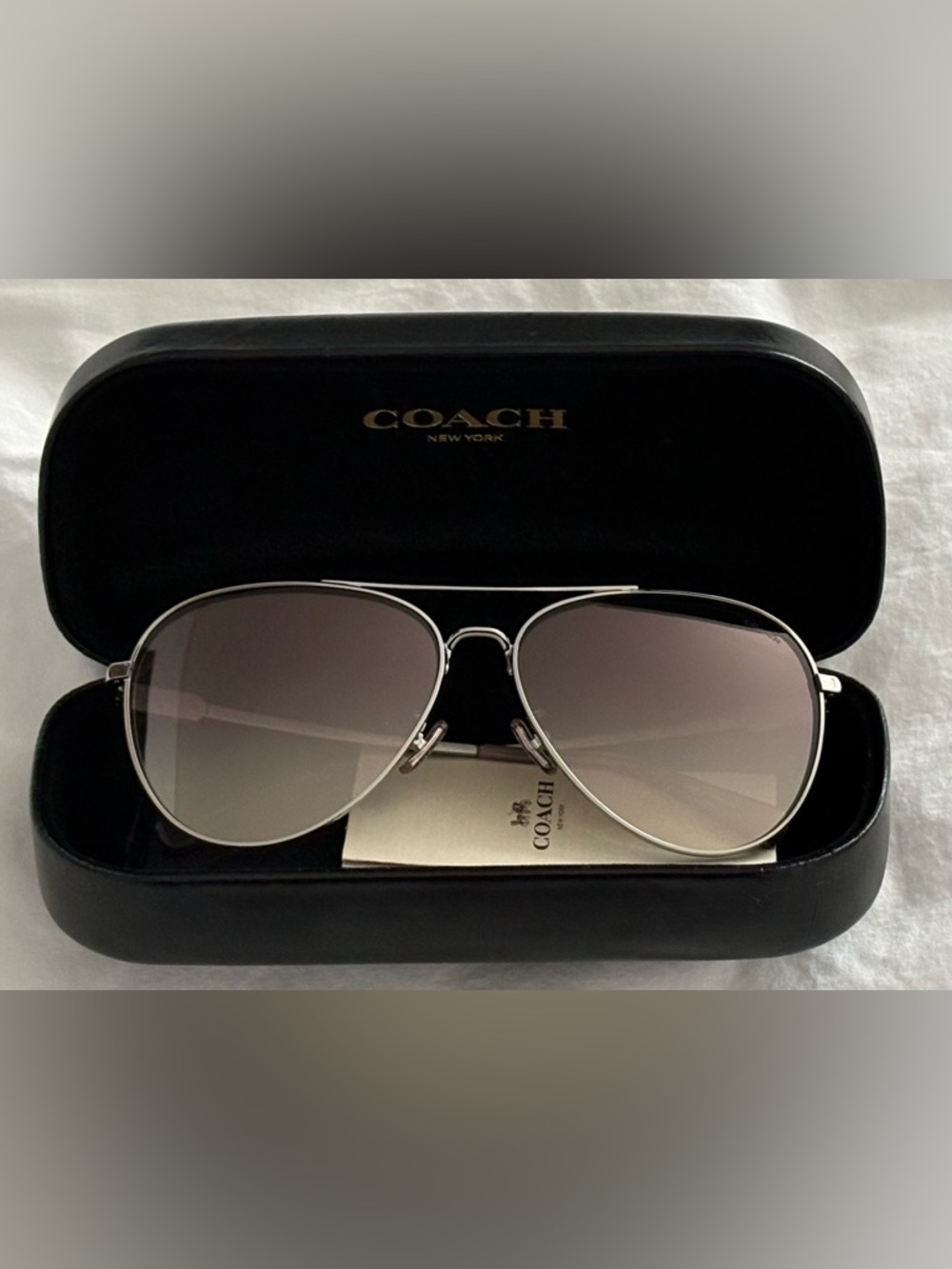 Coach Women’s  Silver Aviator Sunglasses with Brown Gradient Lenses